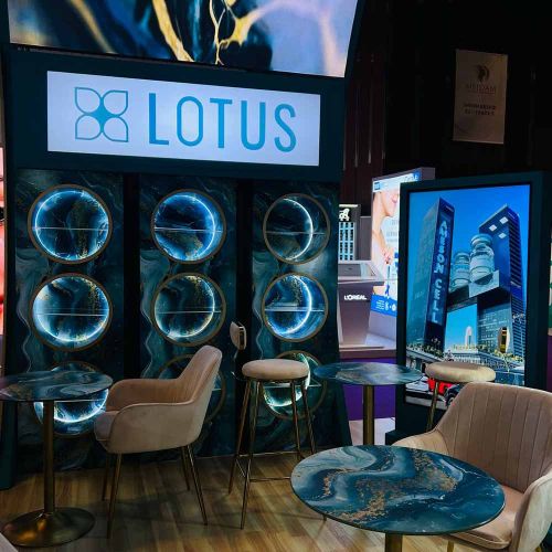 Custom Exhibition Booth with Illuminated Display Panels for Lotus in Ras Al Khaimah